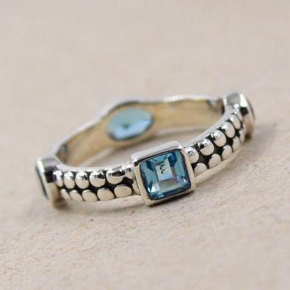 Blue Topaz Eternity Band ,solid 925 Sterling..