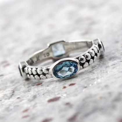 Blue Topaz Eternity Band ,solid 925 Sterling..